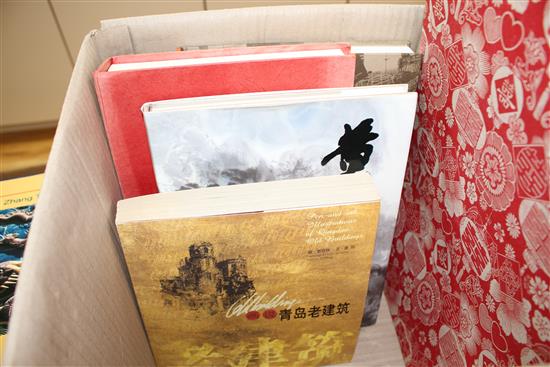 Eight China related books, including: Tongsheng, Zhang (editor) - China, 2001, with slip case, Zhi, Yu - Red Buildings of Honglok Campa